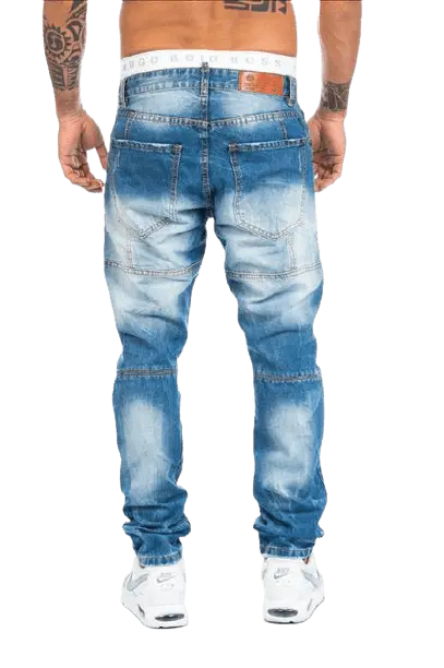Jeans med slidmærker